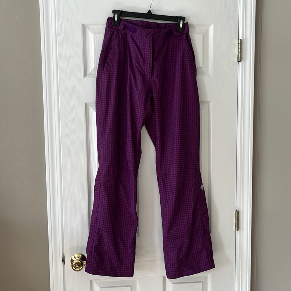 Sunice size S Typhoon ladies golf rain pants.